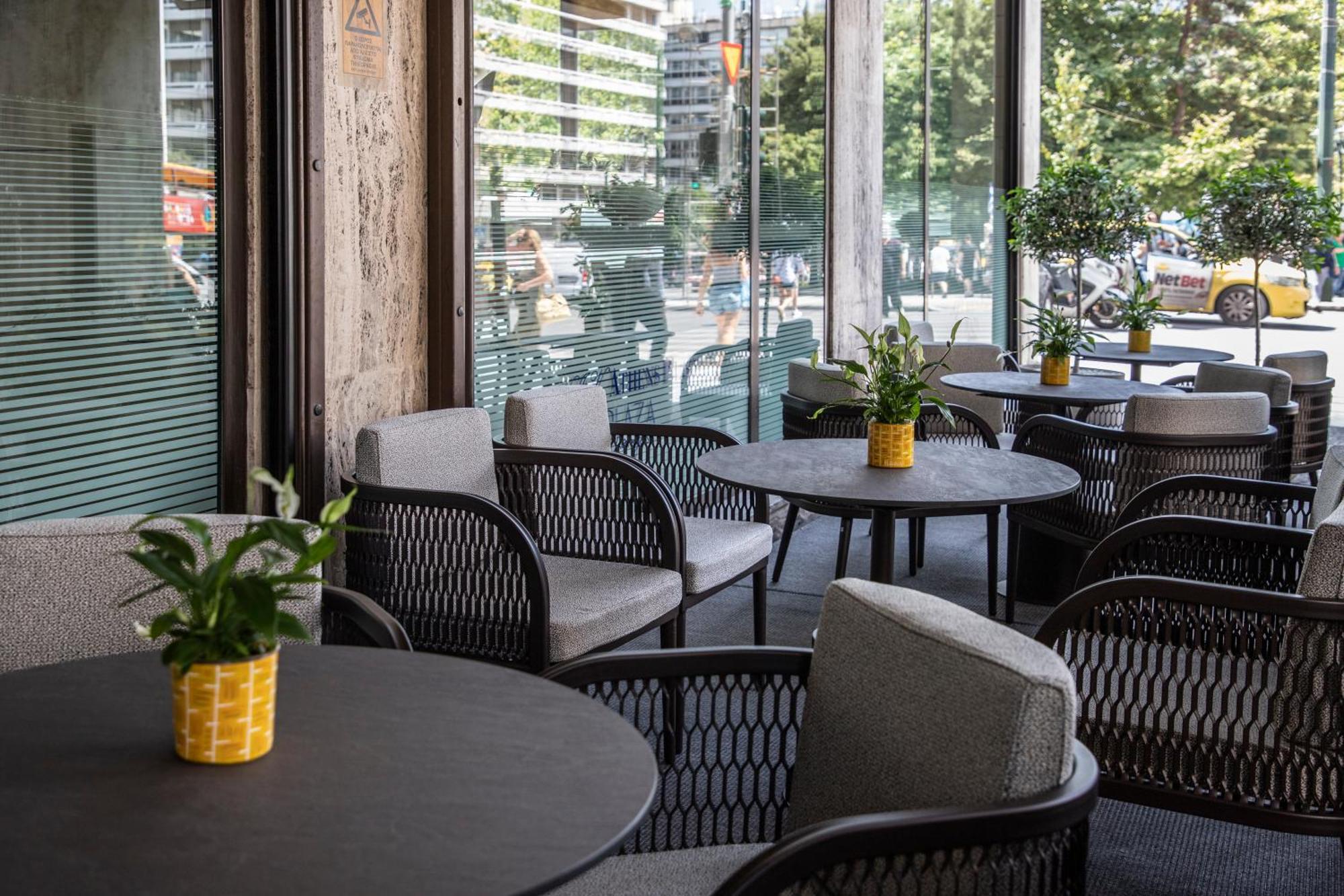 Njv Athens Plaza Hotel Bagian luar foto Interior of the restaurant