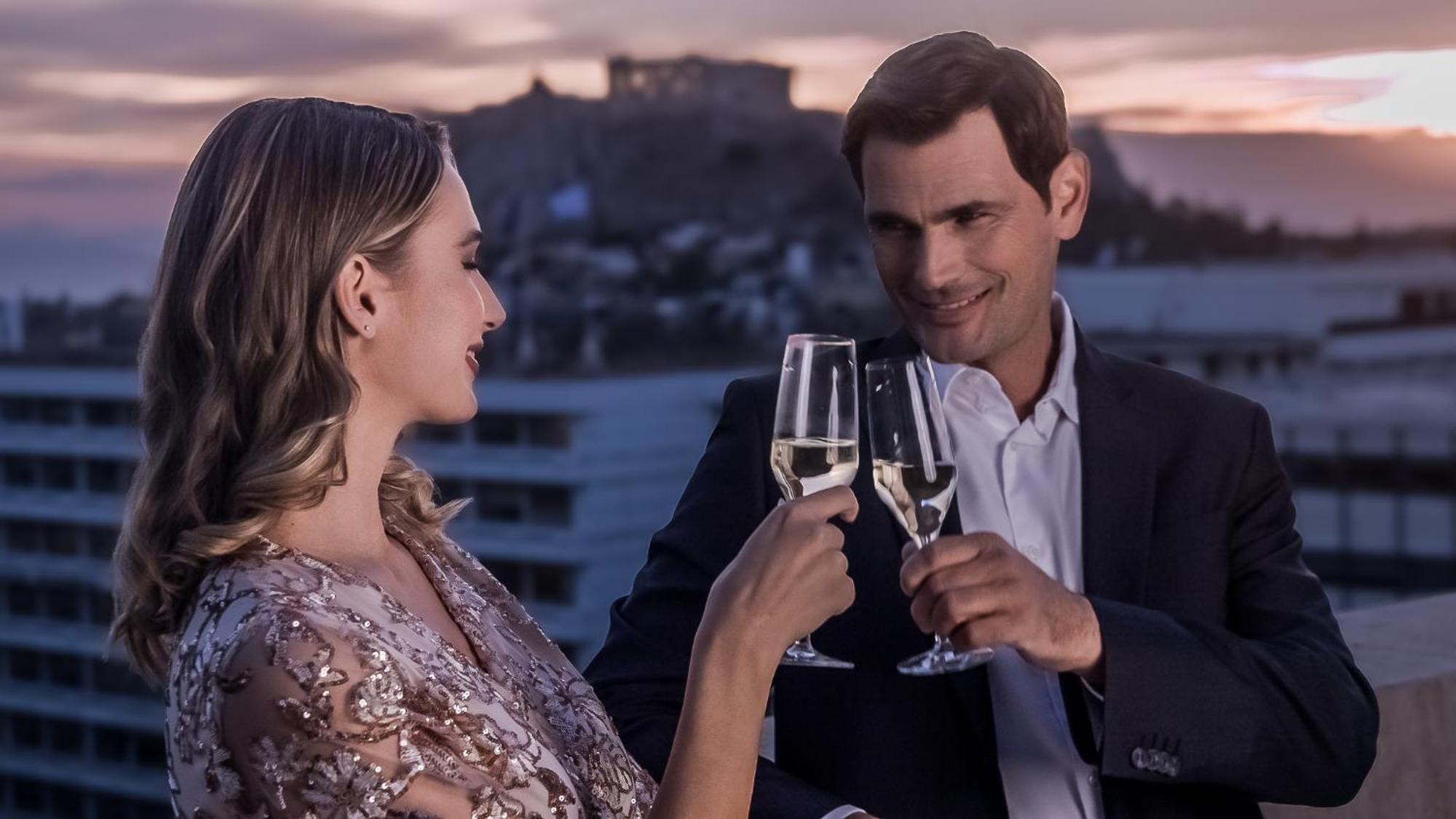Njv Athens Plaza Hotel Bagian luar foto A couple toasting with champagne